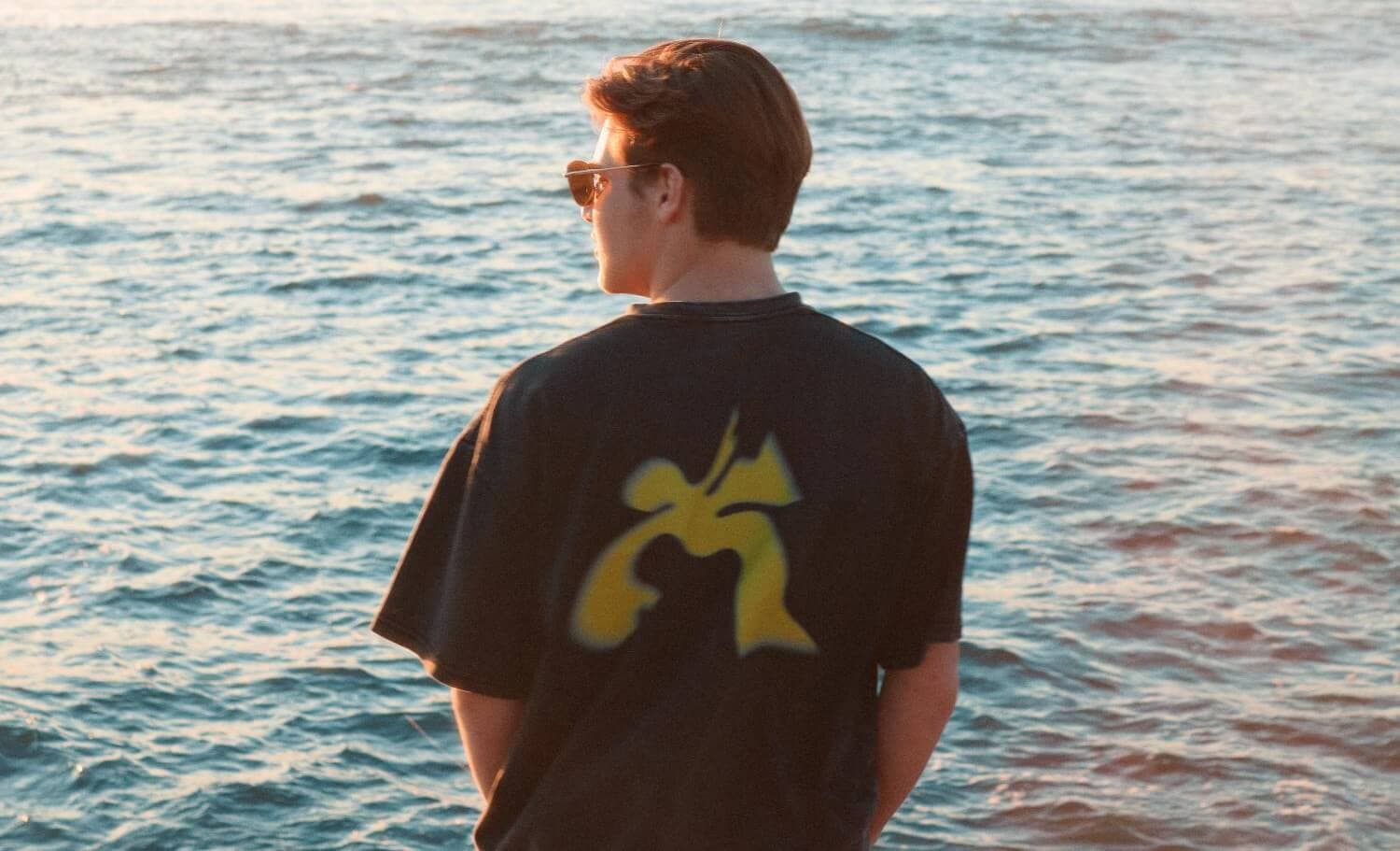 Jonah Genser wide falling man freestyle trampoline tshirt